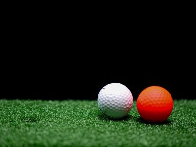 Golfboll vit och röd